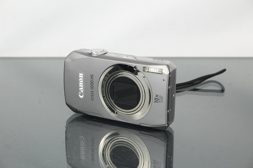 Canon Ixus 1000 HS - Dutch|Thrift