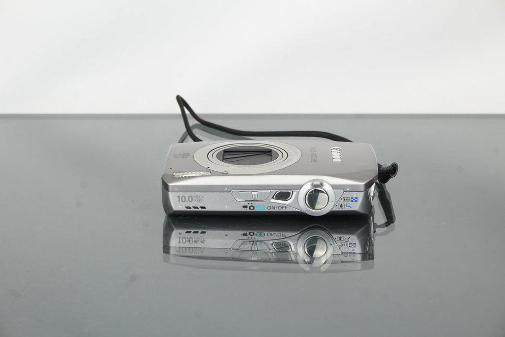 Canon Ixus 1000 HS - Dutch|Thrift